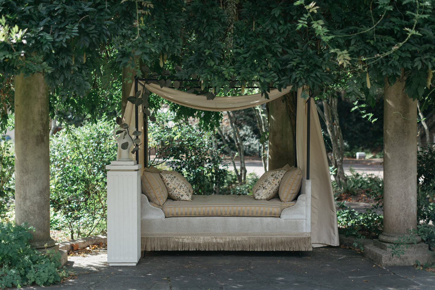 Serenbe Daybed front view with pair of Botanico pillows on terrace – Page House Studio