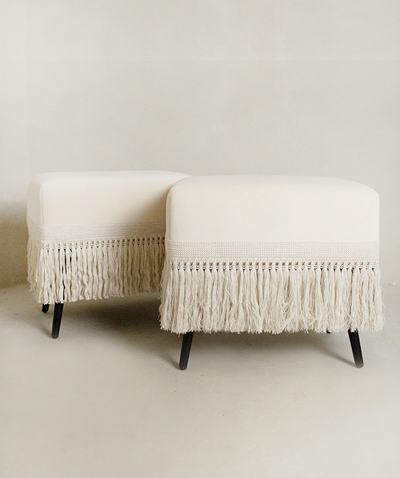 Pair of Crema stools in cream velvet with ecru trim, modern seating accent