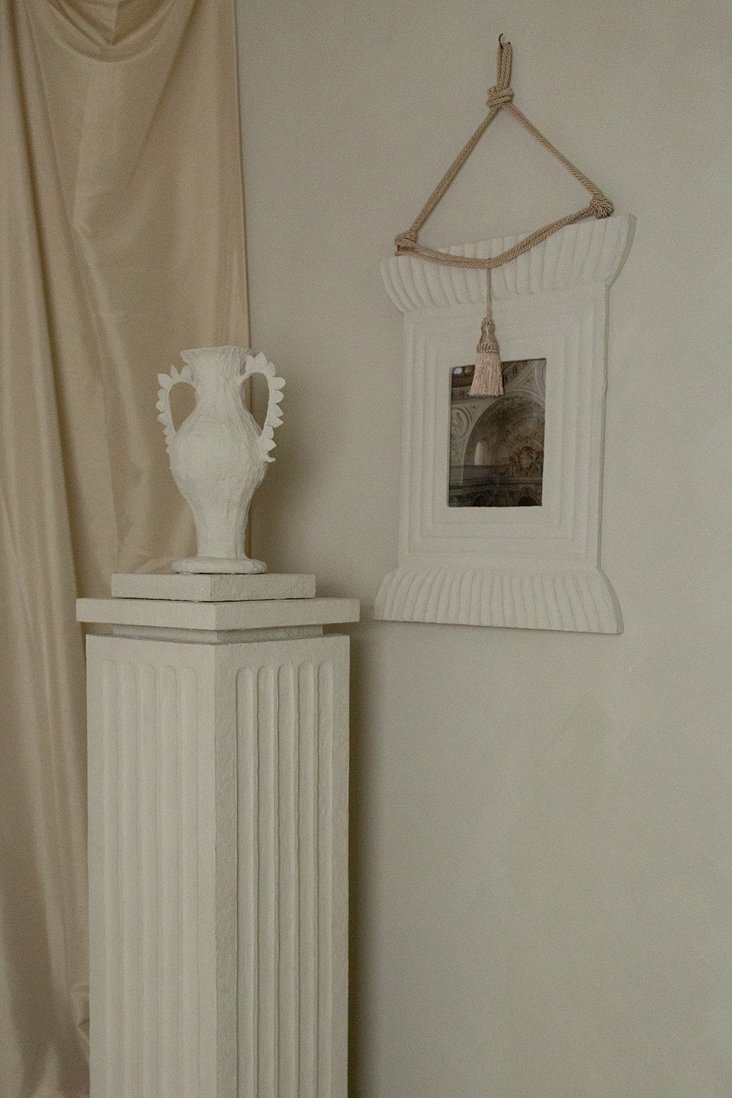 Close-up of Elisabetta picture frame styled with books and holiday accents – Page House Studio