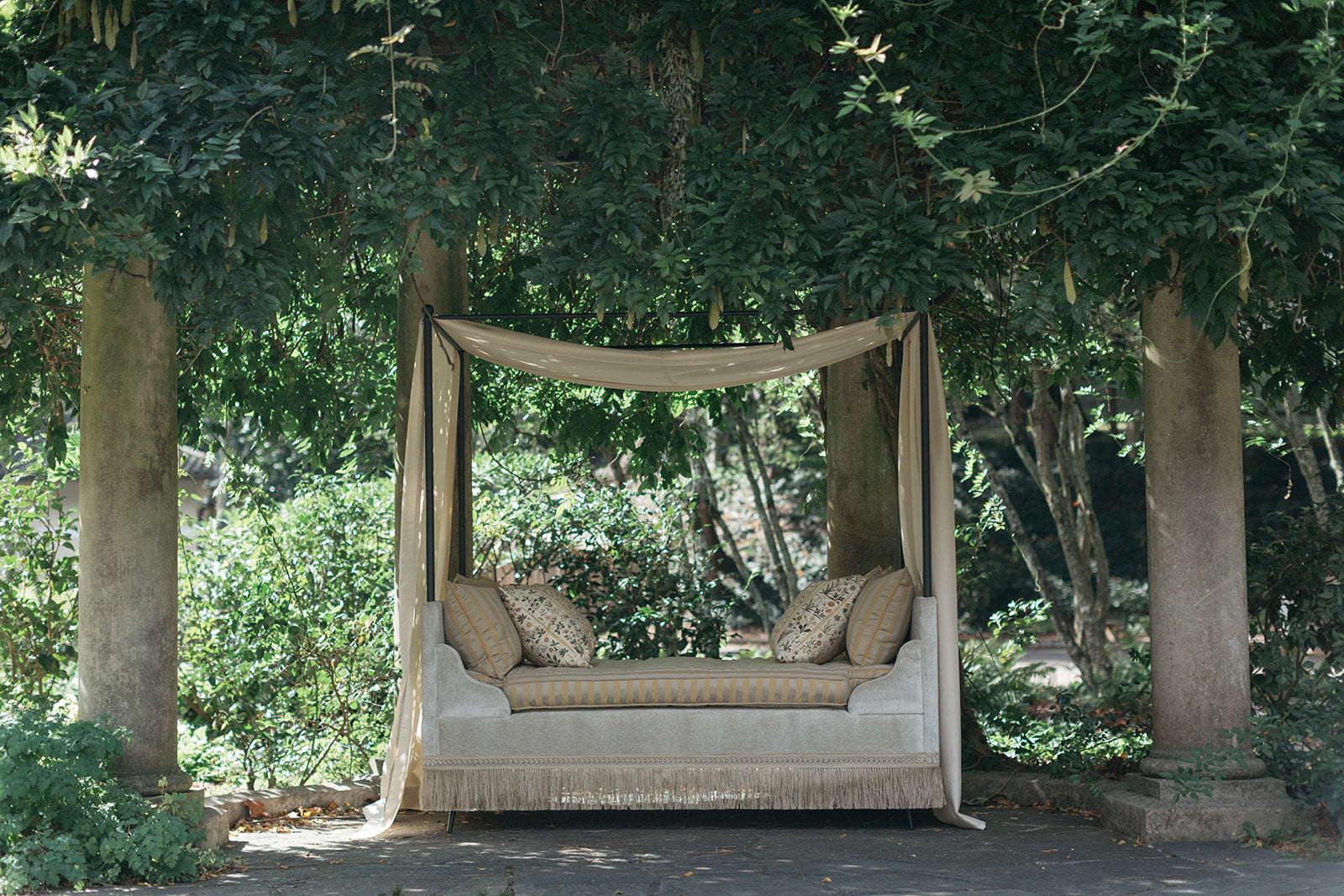 Front view of Serenbe Daybed styled in outdoor terrace – Page House Studio