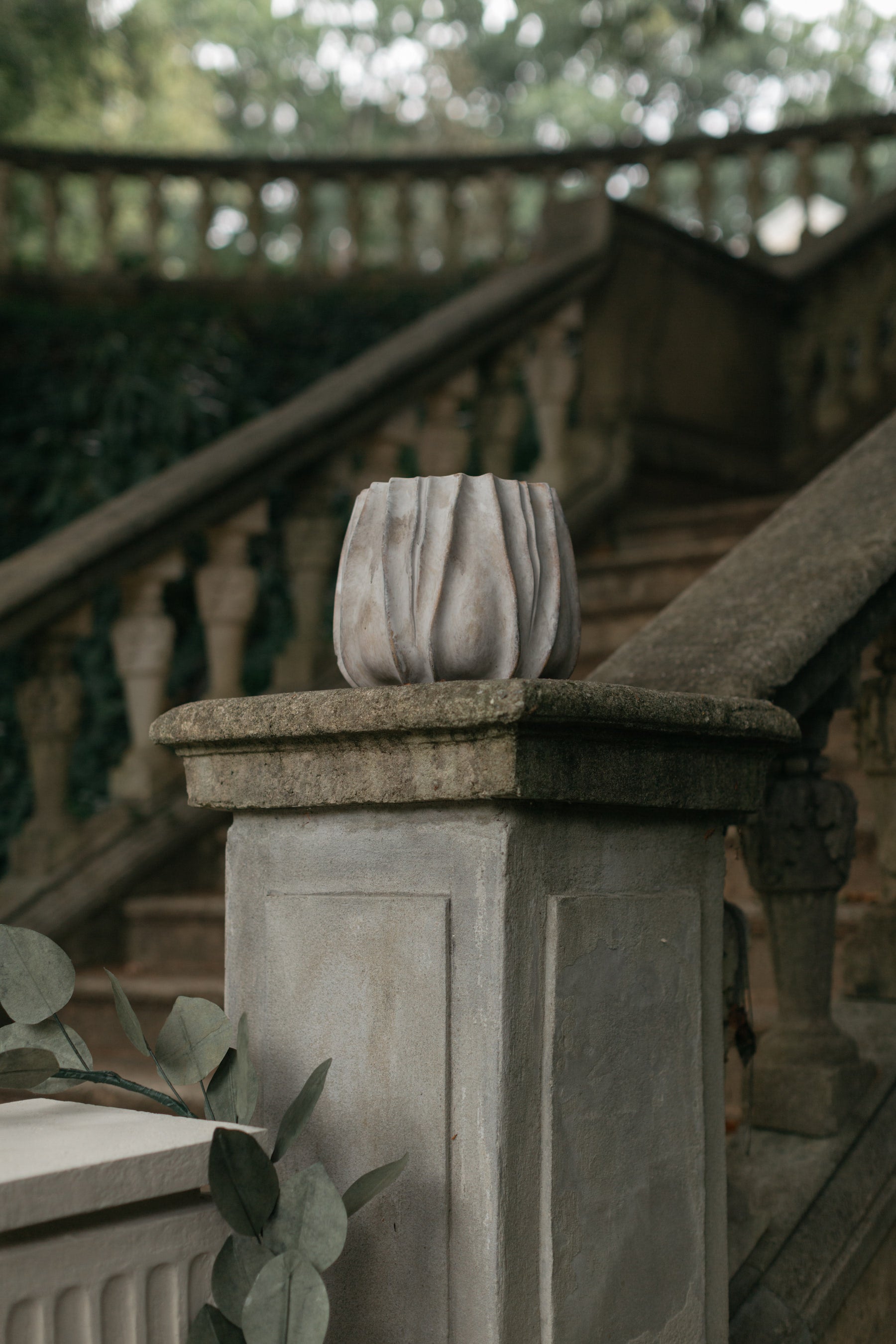 Close-up of fabric-like texture on cement tulip planter – Page House Studio